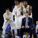 Illustration for article titled Eight Photos Of Coach K Sitting On A Lil Stool